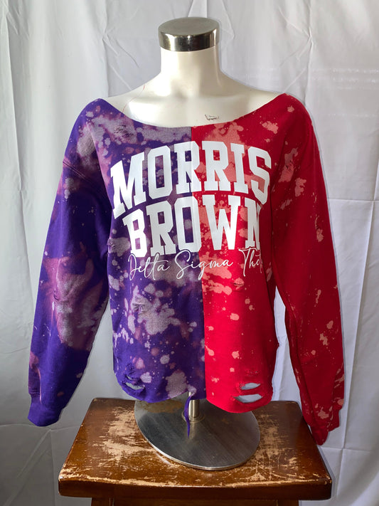 Two-tone purple and red sweatshirt with 'Morris Brown Delta Sigma Theta' text on a mannequin against a white background.